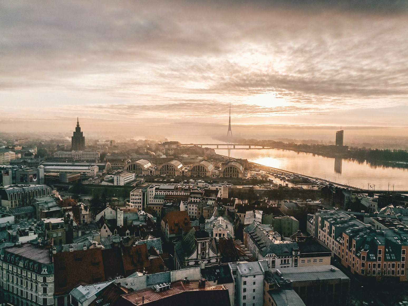 Riga Old Town with historic spires and the Daugava River